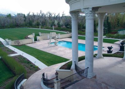 view of lawn and swimming pool