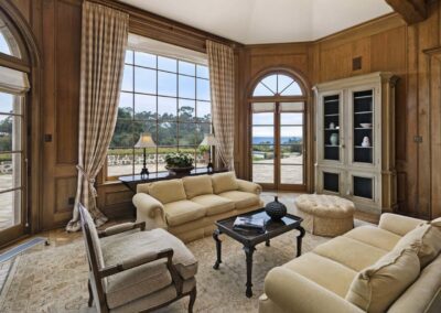 French Country Equestrian Estate sitting area with view of the patio