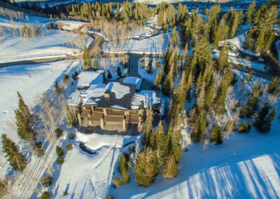 Gorgeous Mountain Estate aerial view snow-covered landscape
