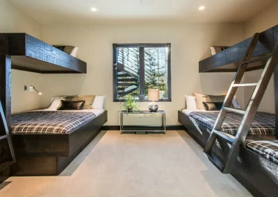 Gorgeous Mountain Estate bedroom with custom build bunk beds